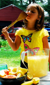 Girl Trying Honey-Infused Lemonade